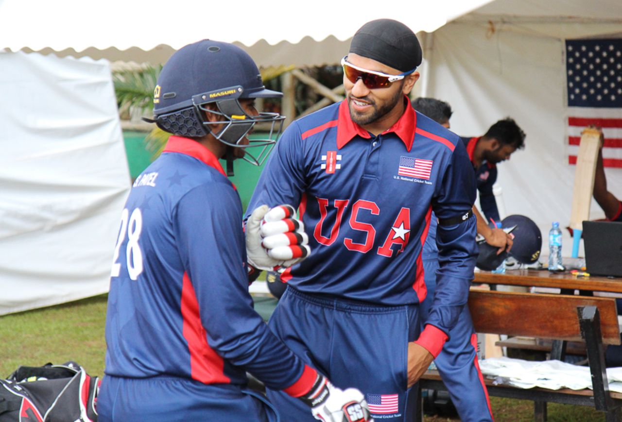 Jessy Singh gives Sagar Patel encouragement as he gets ready to debut, Oman v USA, ICC World Cricket League Division Three, Entebbe, May 23, 2017