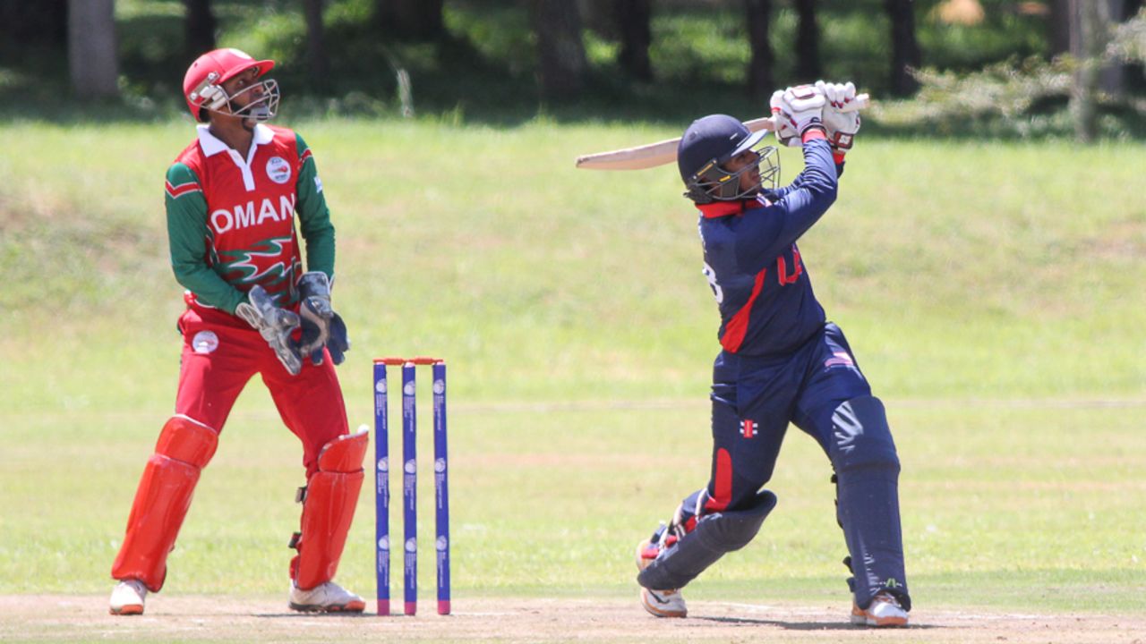 Sagar Patel lofts over wide mid-on for six during his 34, Oman v USA, ICC World Cricket League Division Three, Entebbe, May 23, 2017
