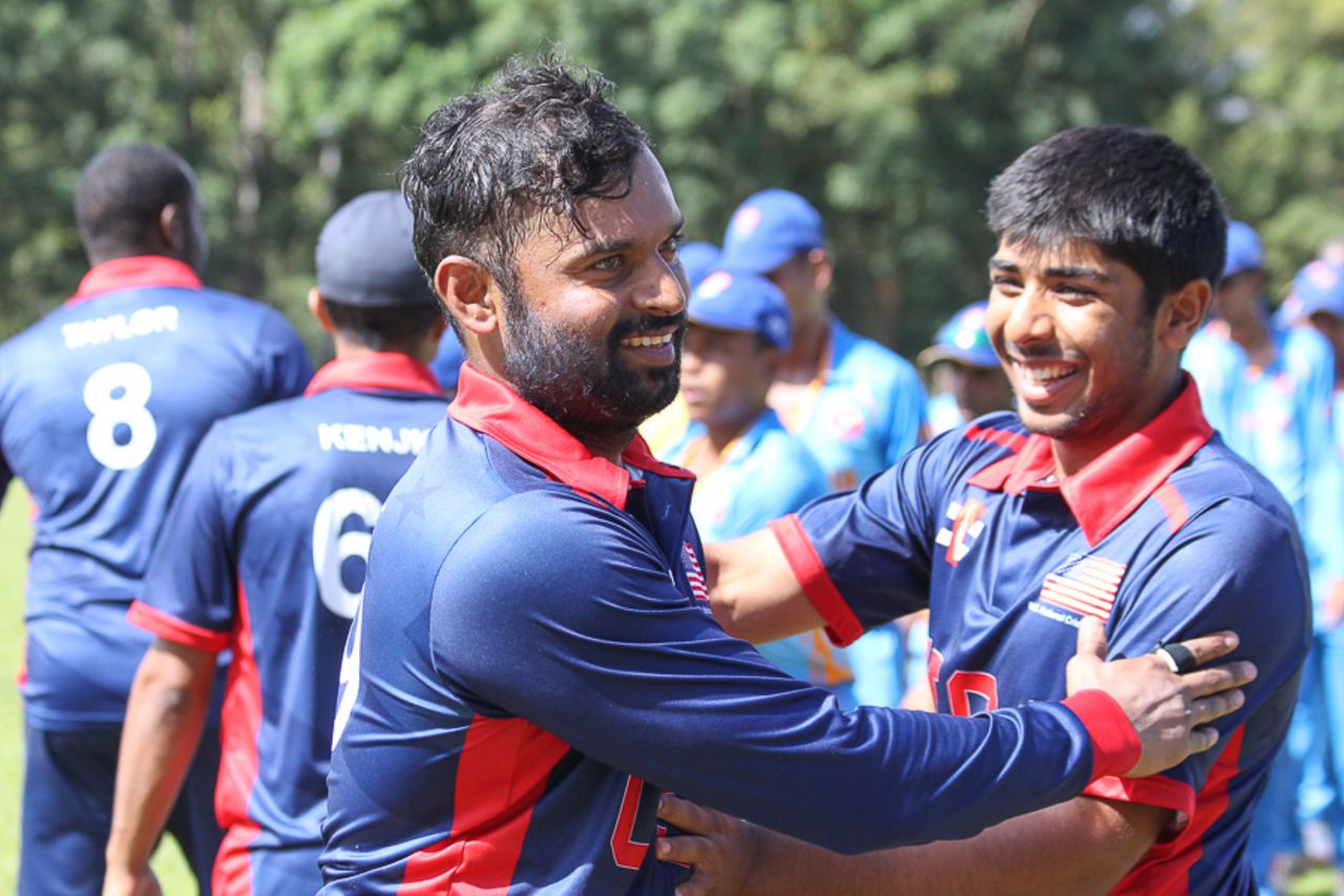 Ibrahim Khaleel gets congratulated by his room-mate Sagar Patel after finishing 49 not out, Malaysia v USA, ICC World Cricket League Division Three, Kampala, May 24, 2017