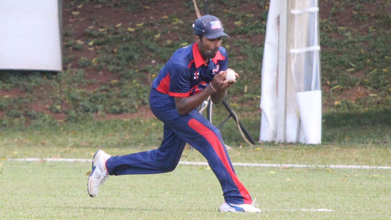 Mrunal Patel holds on to a catch at fine leg to dismiss Selladore Vijayakumar, Singapore v USA, ICC World Cricket League Division Three, Kampala, May 26, 2017 