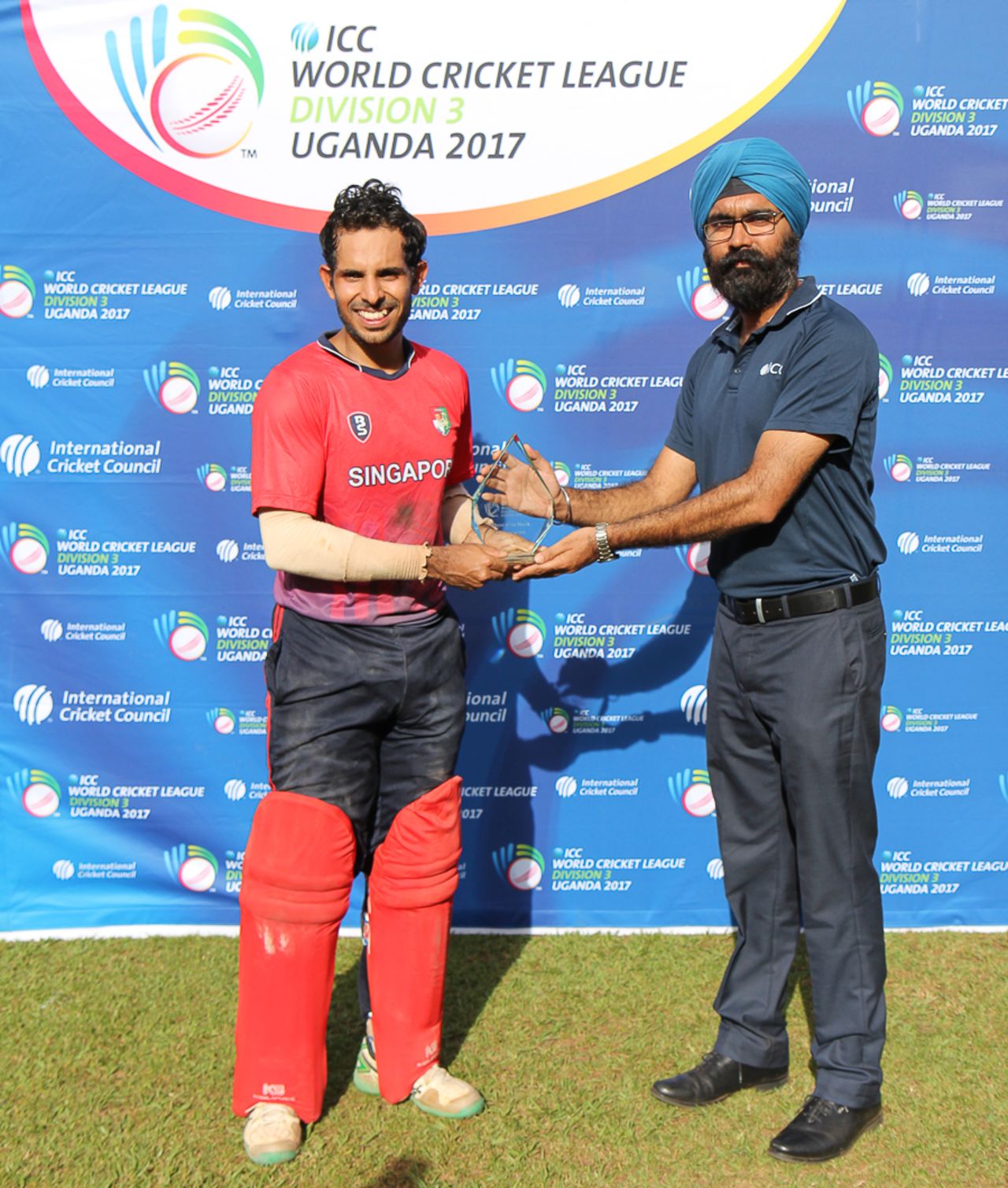 Arjun Mutreja accepts the Man of the Match award from ICC official Gurjit Singh, Singapore v USA, ICC World Cricket League Division Three, Kampala, May 26, 2017