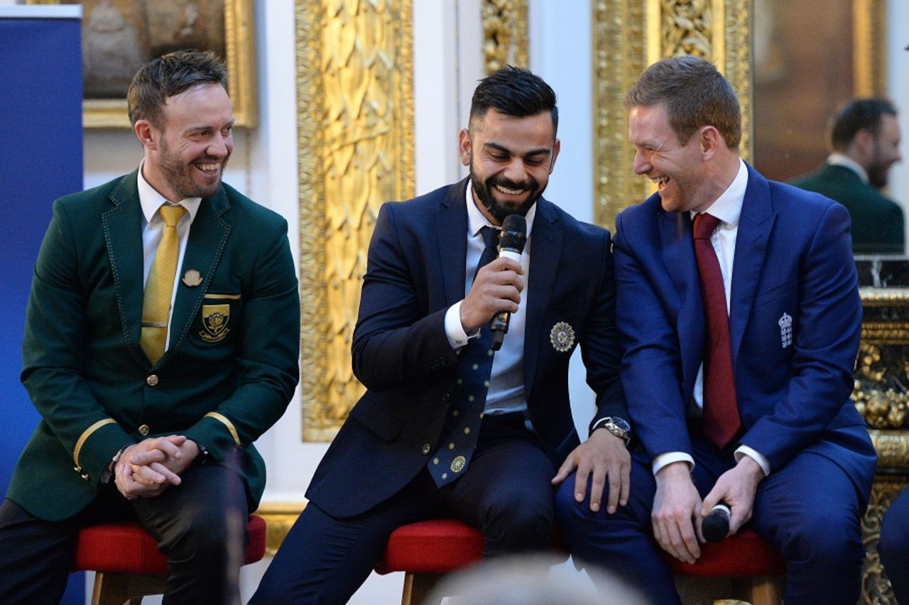 AB de Villiers, Virat Kohli and Eoin Morgan share a lighter moment at the Champions Trophy dinner, Lancaster House, London, May 30, 2017