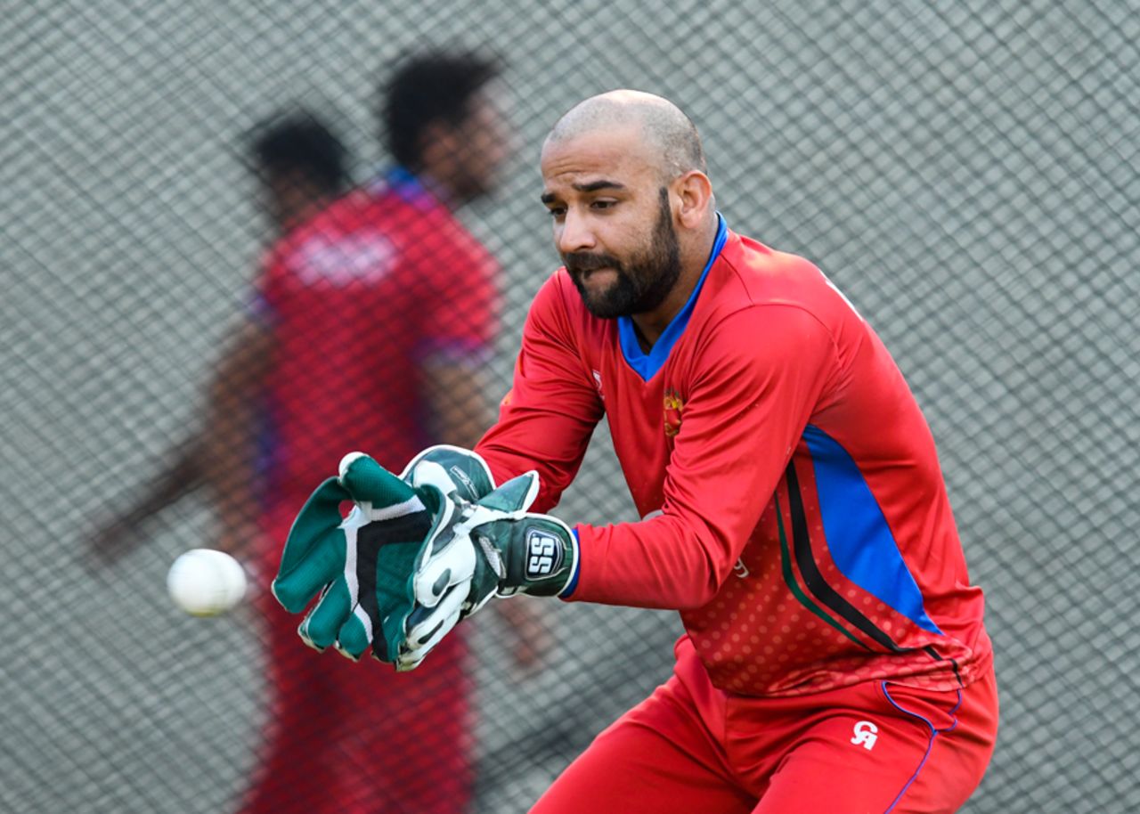 Shafiqullah hones his glovework during a training session, West Indies v Afghanistan, St. Kitts, June 1, 2017