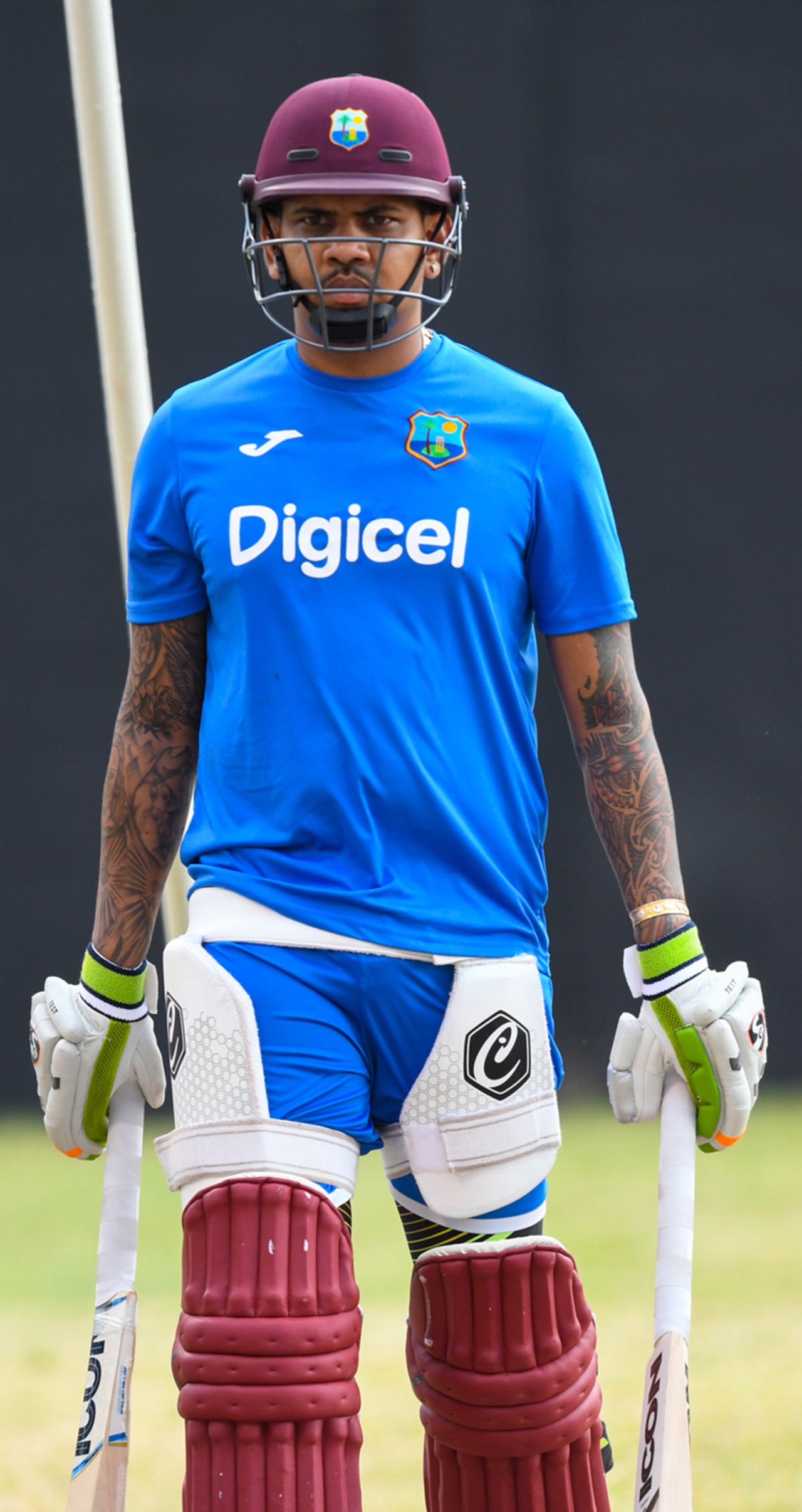 Sunil Narine walks in at a nets session wielding two bats, West Indies v Afghanistan, St. Kitts, June 1, 2017