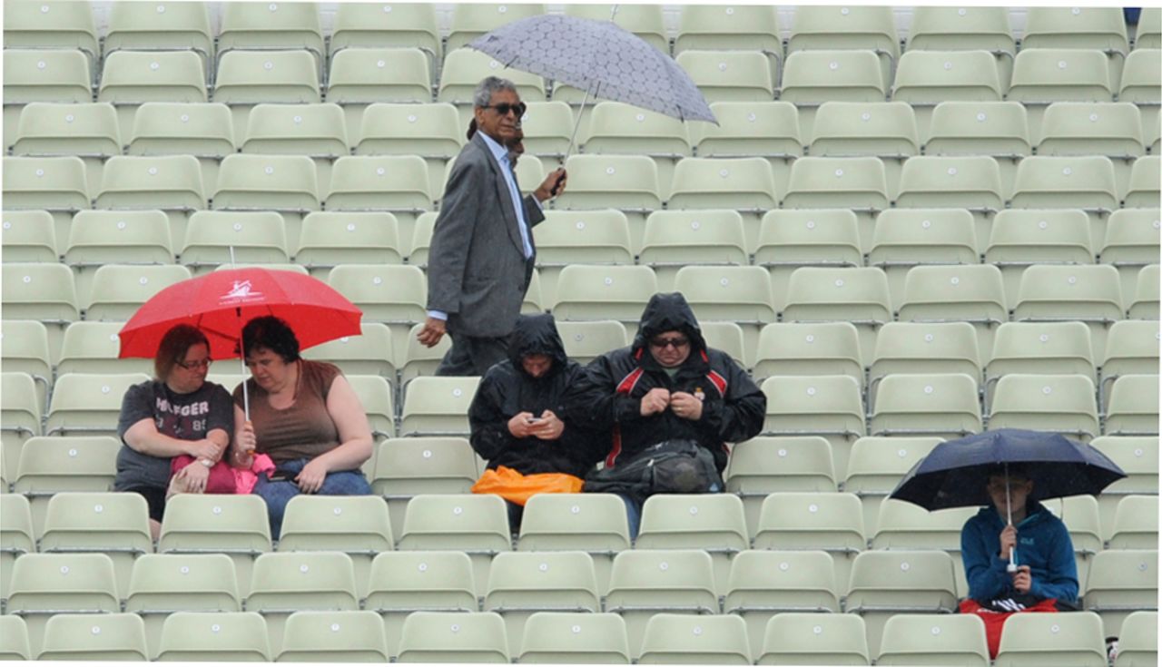 Spectators wait for the match to resume after rain disrupted play, Australia v New Zealand, Champions Trophy, Group A, Edgbaston, June 2, 2017