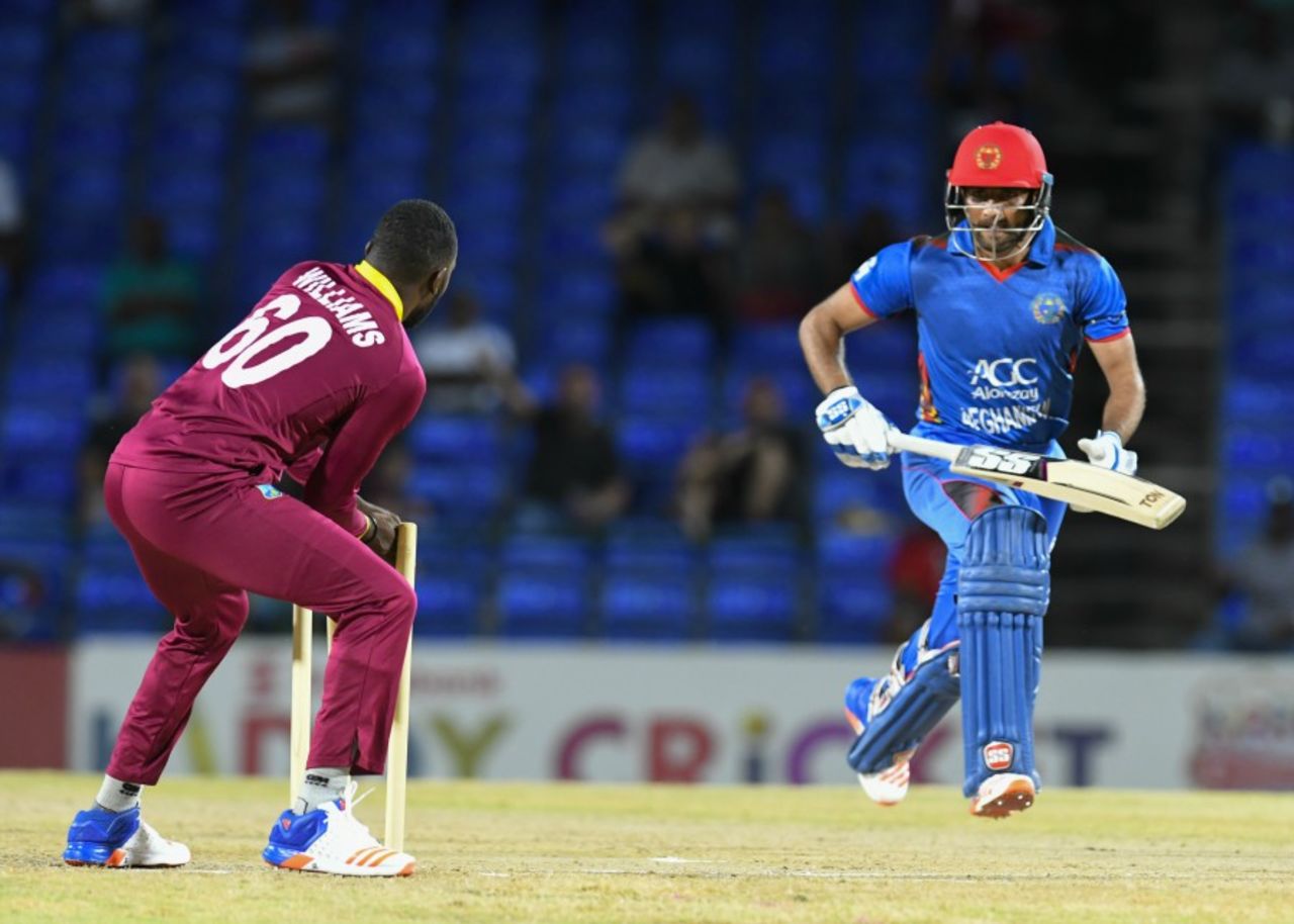 Kesrick Williams removes the bails to run Usman Ghani out, West Indies v Afghanistan, 1st T20, Basseterre, June 2, 2017