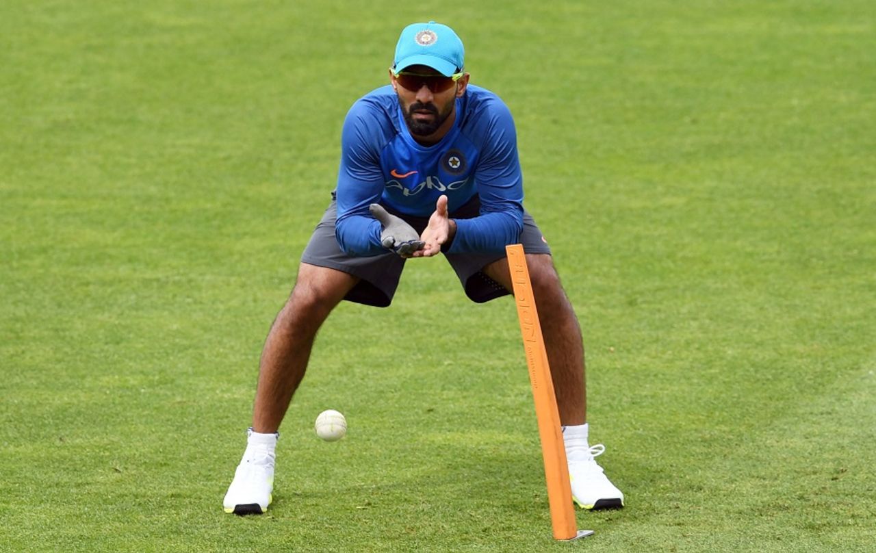 Dinesh Karthik prepares to collect a throw at a training session on match eve, India v Pakistan, Champions Trophy, Group B, Birmingham, June 3, 2017
