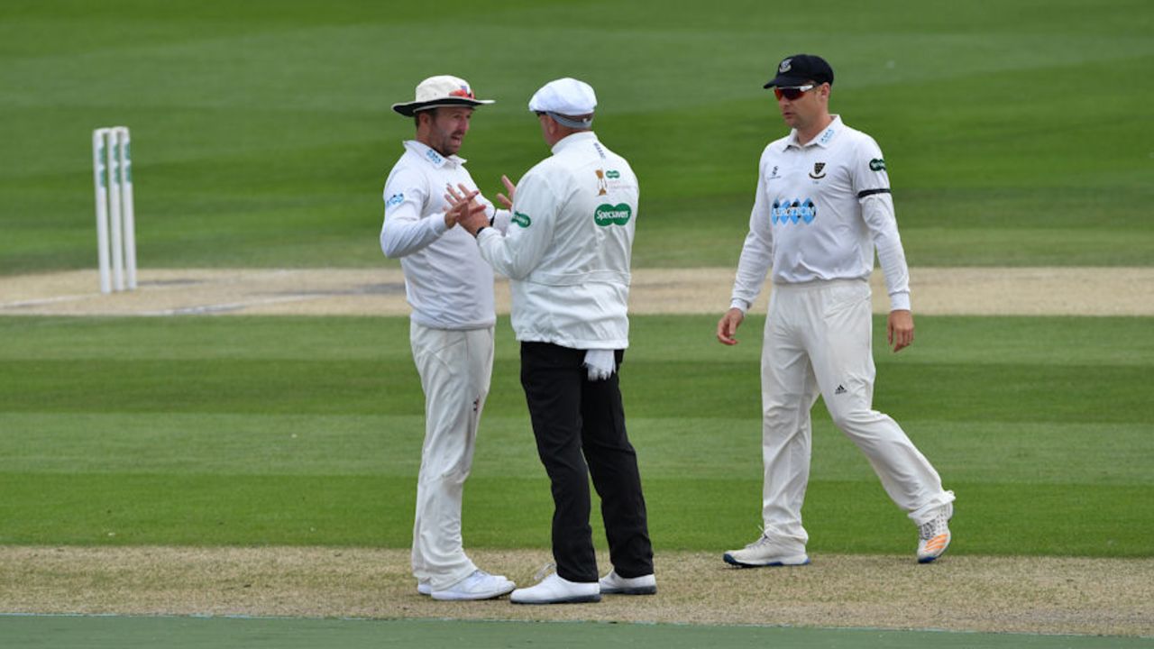 Sussex captain Chris Nash debates a decision with umpire Neil Mallender after Brett D'Oliveira's dismissal is reversed, Sussex v Worcestershire, Specsavers Championship Divison Two, Hove, June 4, 2017.