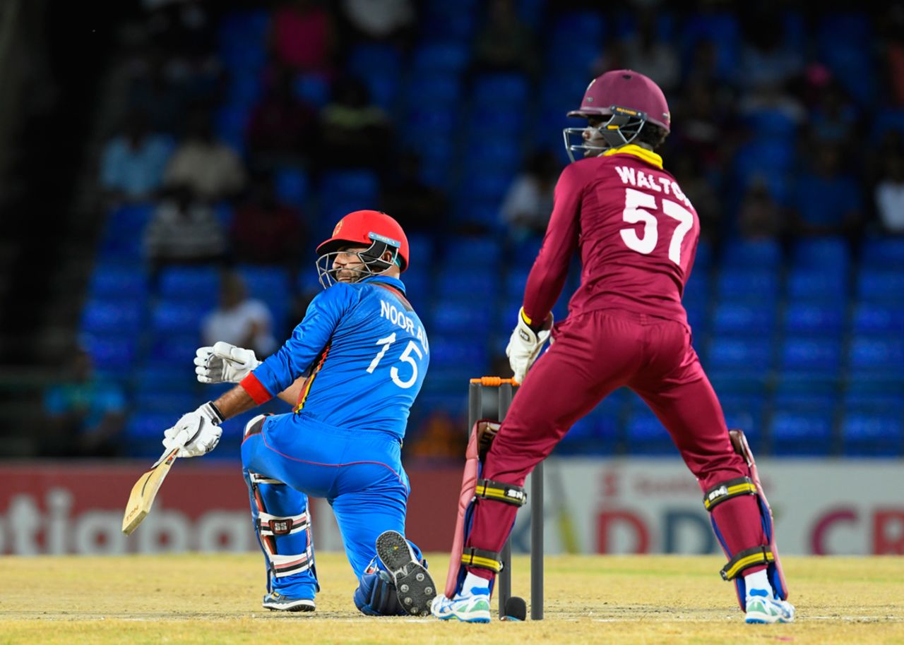 Noor Ali Zadran's bat slips out of his bottom hand as he sweeps, West Indies v Afghanistan, 3rd T20I, St Kitts, June 5, 2017