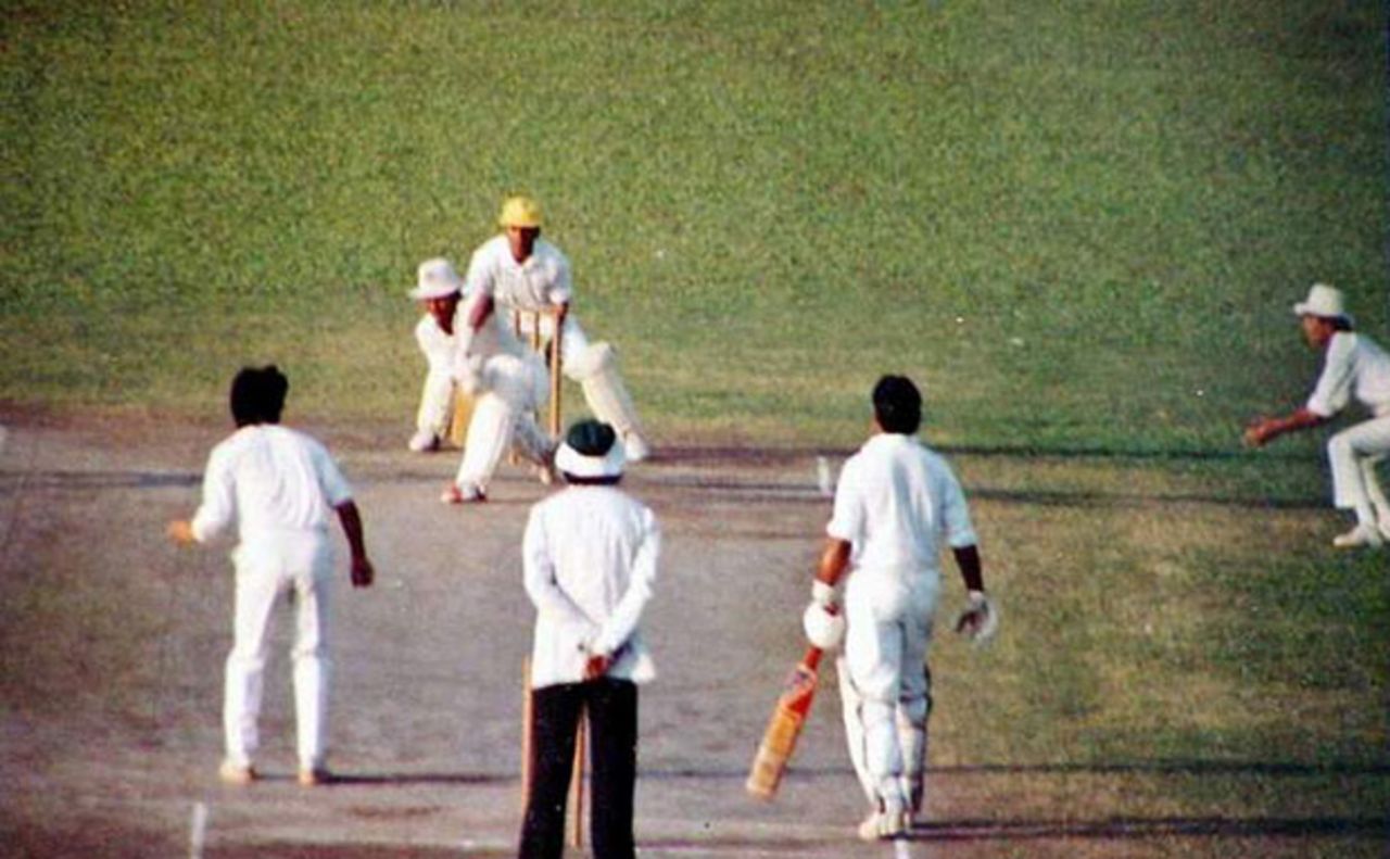 Bangladesh Biman's Rafiqul Alam defends a delivery from offspinner Saidul Islam during a Dhaka Premier League match at the Bangabandhu National Stadium in Dhaka in 1991
