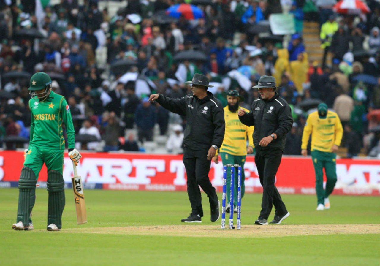 Umpires S Ravi and Richard Illingworth call for the covers, Pakistan v South Africa, Champions Trophy, Group B, Edgbaston, June 7, 2017