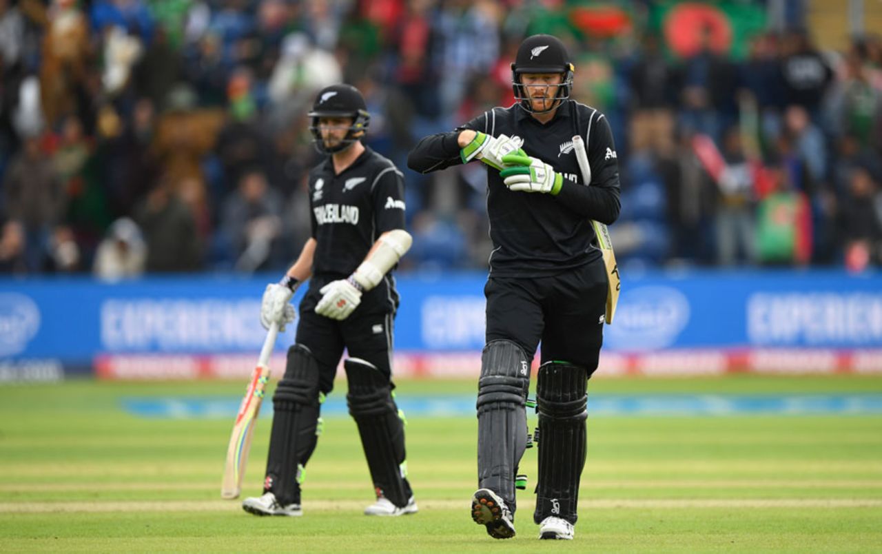 Martin Guptill walks back to the dressing room after consulting Kane Williamson about an lbw review, New Zealand v Bangladesh, Group A, Champions Trophy 2017, Cardiff, June 9, 2017