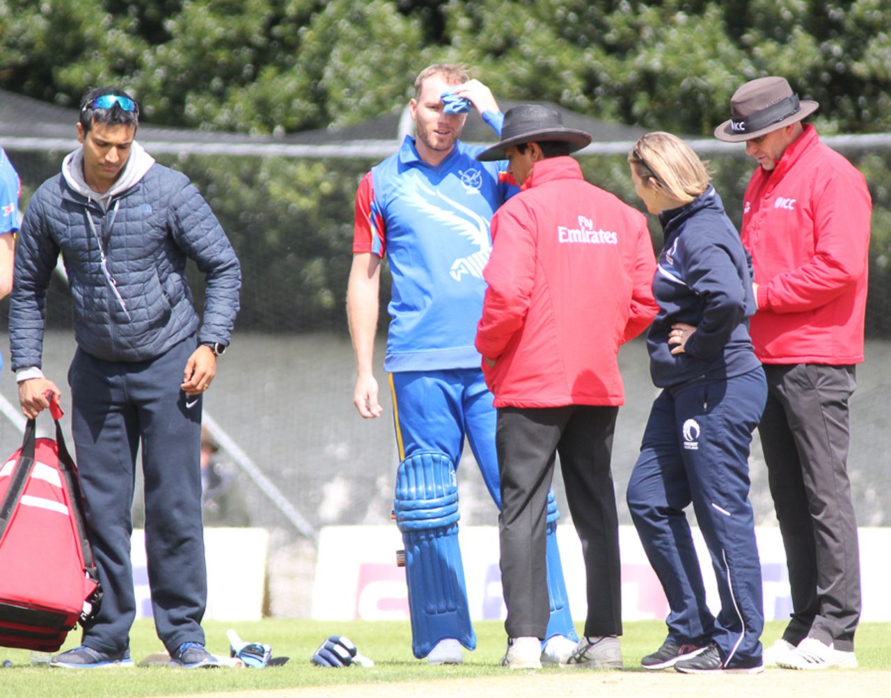 Christi Viljoen gets an ice pack after being hit in the helmet with a Chris Sole bouncer, Scotland v Namibia, ICC WCL Championship, Edinburgh, June 12, 2017