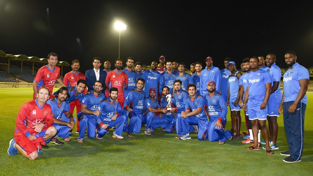 West Indies and Afghanistan players pose for a photograph after the third ODI was washed out, West Indies v Afghanistan, 3rd ODI, St Lucia, June 14, 2017