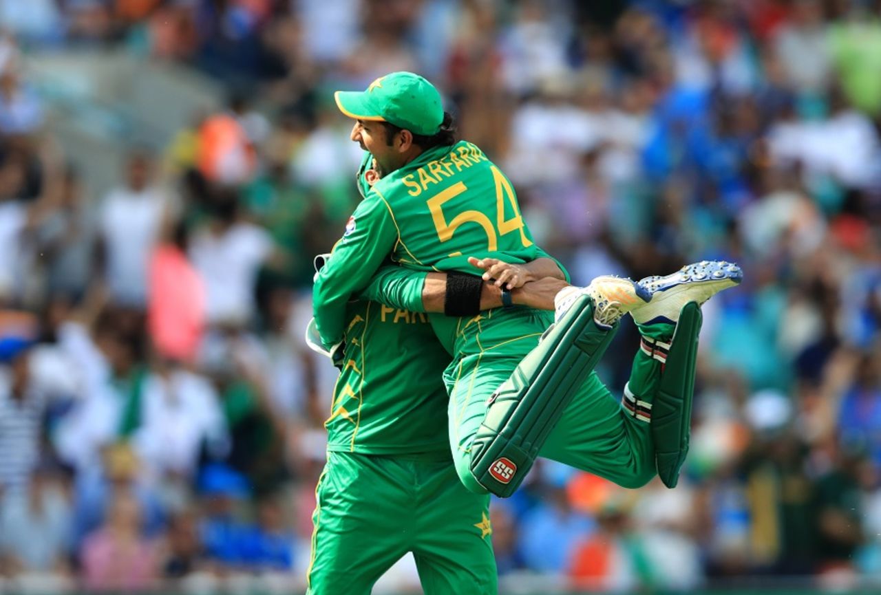 Yippeeee: Sarfraz Ahmed bounds into the arms of a team-mate, India v Pakistan, Final, Champions Trophy 2017, The Oval, London, June 18, 2017