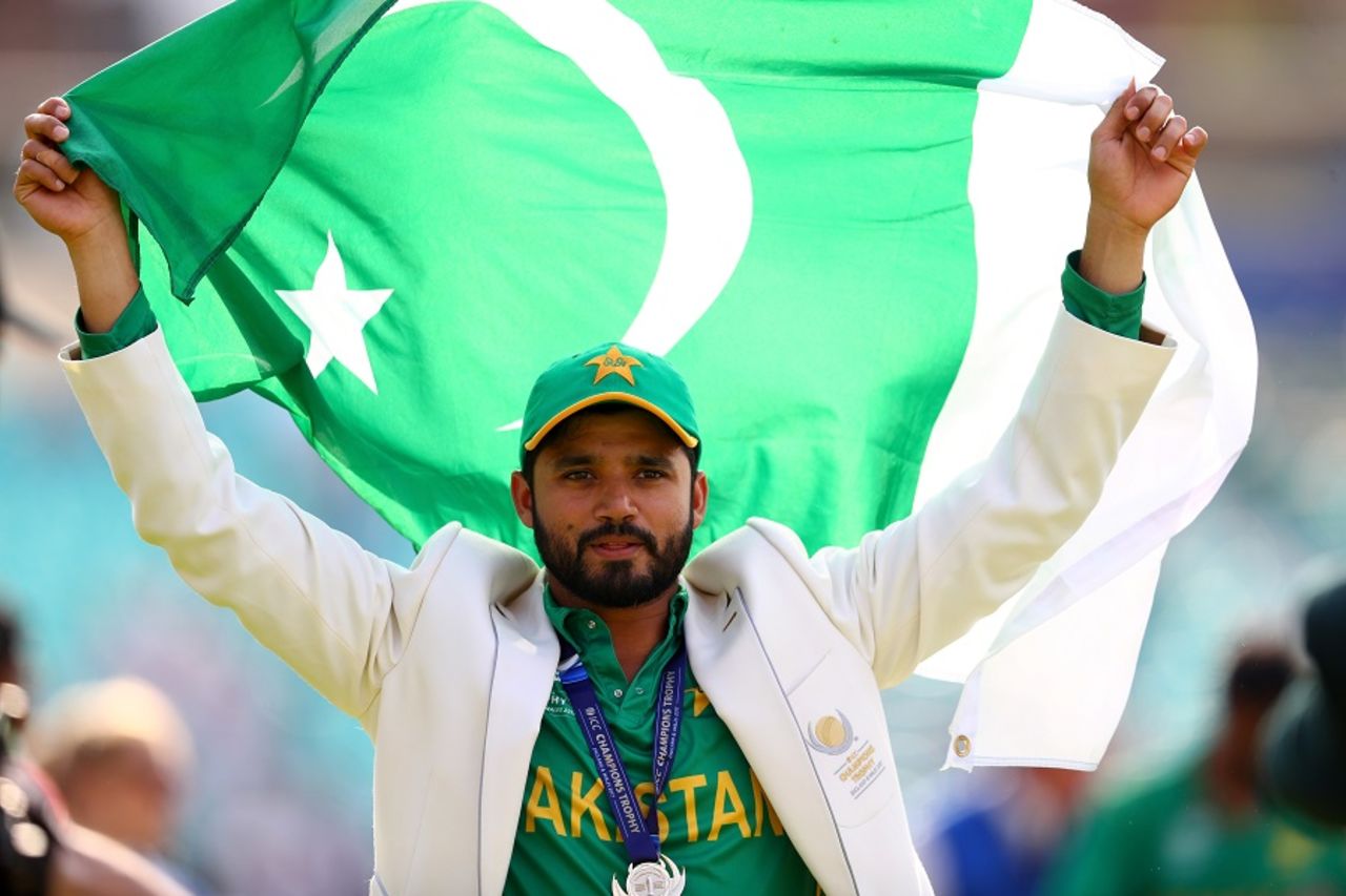 Azhar Ali holds the Pakistan flag aloft after their win in the final, India v Pakistan, Final, Champions Trophy 2017, The Oval, London, June 18, 2017