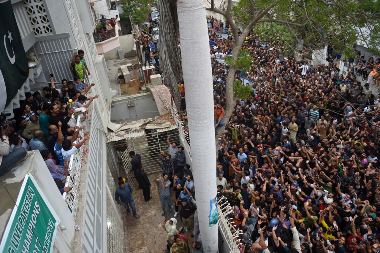Sarfraz Ahmed greets crowds outside his house in Karachi, Karachi, June 20, 2017