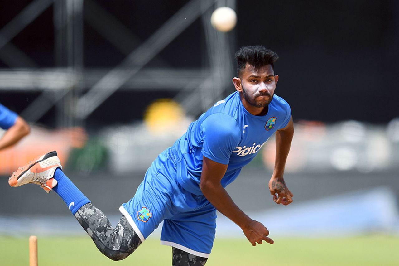 Devendra Bishoo sends down a delivery during a training session on the eve of the first ODI against India, Port of Spain, June 22, 2017