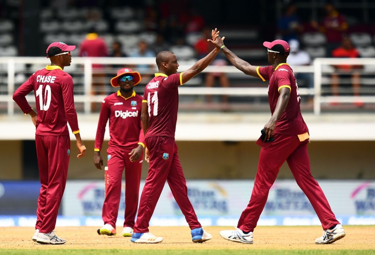 West Indies' players get together to celebrate the dismissal of Ajinkya Rahane, West Indies v India, 2nd ODI, Port-of-Spain, June 25, 2017