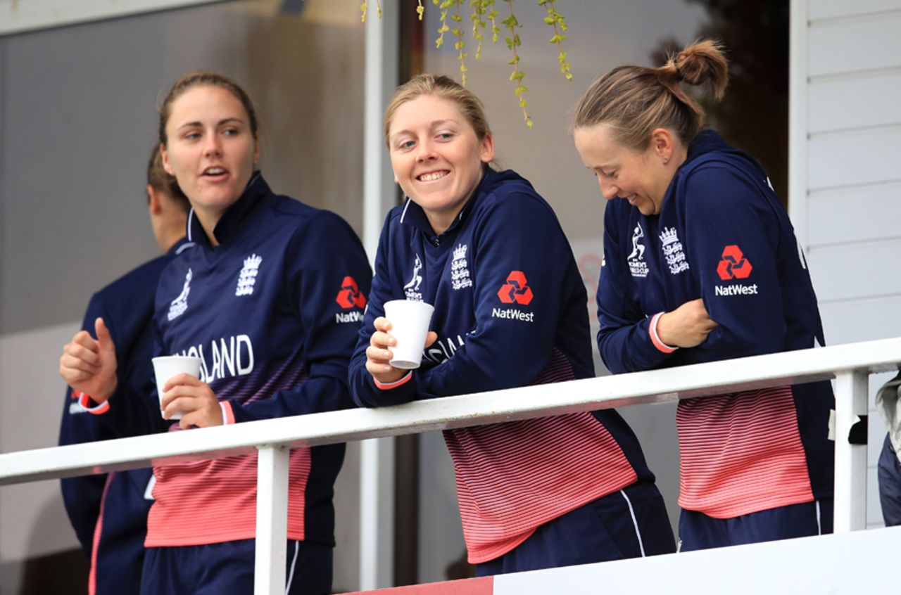 Natalie Sciver, Heather Knight and Fran Wilson share a light moment during the rain delay ahead of the start of play, England v Pakistan, Women's World Cup, Leicester, June 27, 2017
