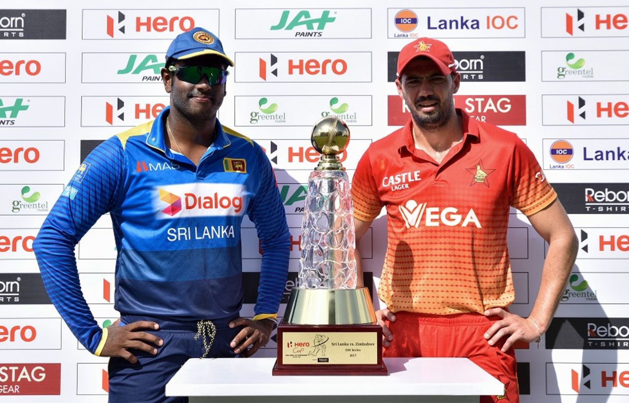 The two captains - Angelo Mathews and Graeme Cremer - with the series trophy, Sri Lanka v Zimbabwe, 1st ODI, Galle, June 30,2017