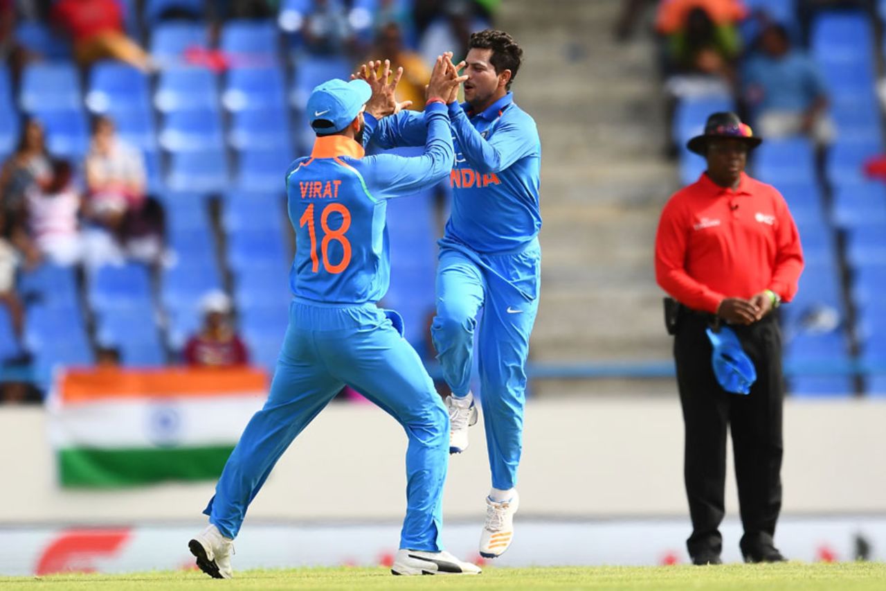 Kuldeep Yadav celebrates a wicket with Virat Kohli, West Indies v India, 3rd ODI, Antigua, June 30, 2017