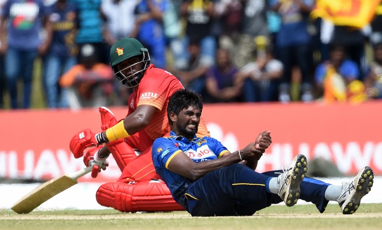 Nuwan Pradeep clutches his wrist in pain, Sri Lanka v Zimbabwe, 2nd ODI, Galle, July 2, 2017