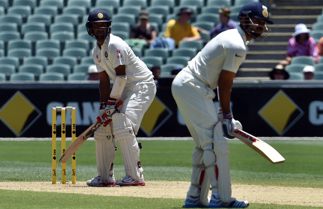 Cheteshwar Pujara faces the ball while Virat Kohli stands at the non-striker's end, Australia v India, 1st Test, Adelaide, 3rd day, December 11, 2014