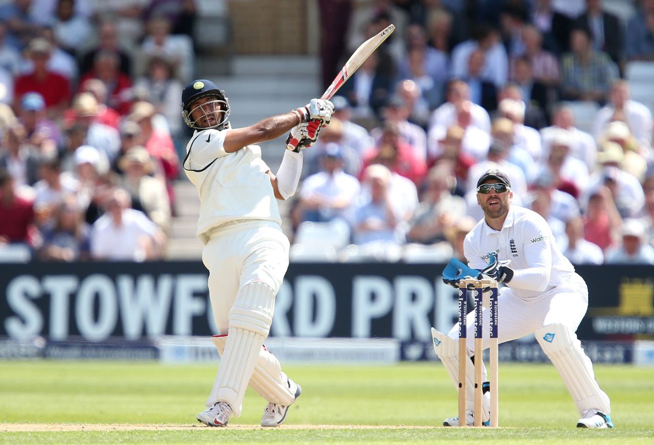 Cheteshwar Pujara hits it in the air, England v India, 1st Investec Test, Trent Bridge, 1st day, July 9, 2014