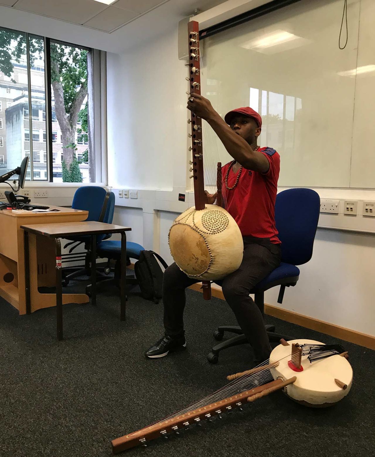 A teacher demonstrates how to play the kora at the School of African and Oriental Studies, London, June 26, 2017