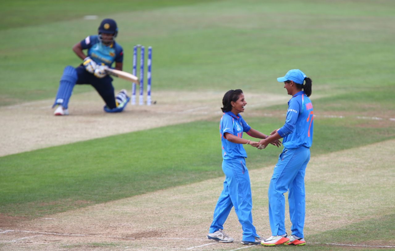 Poonam Yadav celebrates with Harmanpreet Kaur as Chamari Atapattu reflects on her dismissal in the background, India v Sri Lanka, Women's World Cup 2017, Derby, July 5, 2017