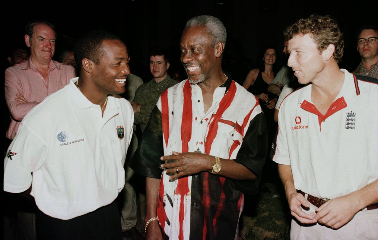 Jamaica prime minister talks to Brian Lara and Mike Atherton at Jamaica House, Kingston, January 30, 1998