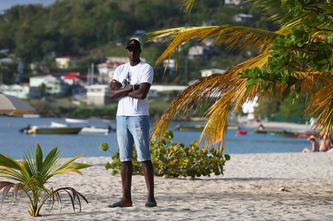 Jason Holder poses on a beach in Grenada, April 20, 2015