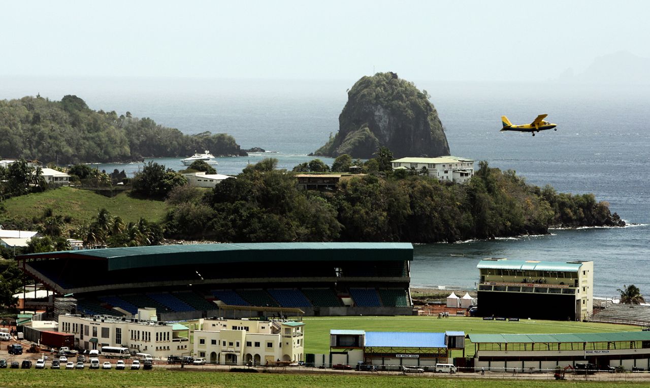 A plane flies over the Arnos Vale Ground in St Vincent, March 4, 2007