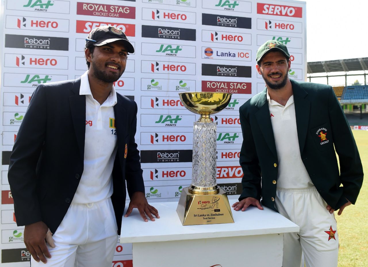 Dinesh Chandimal and Graeme Cremer pose with the Test series trophy, Sri Lanka v Zimbabwe, Only Test, Colombo, 1st day, July 14, 2017