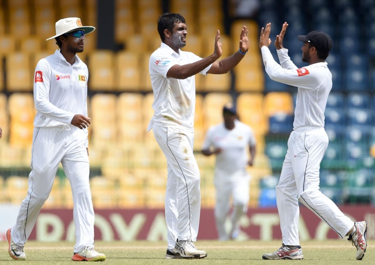Dilruwan Perera celebrates with team-mates after taking out Malcolm Waller, Sri Lanka v Zimbabwe, only Test, 4th day, Colombo, July 17, 2017