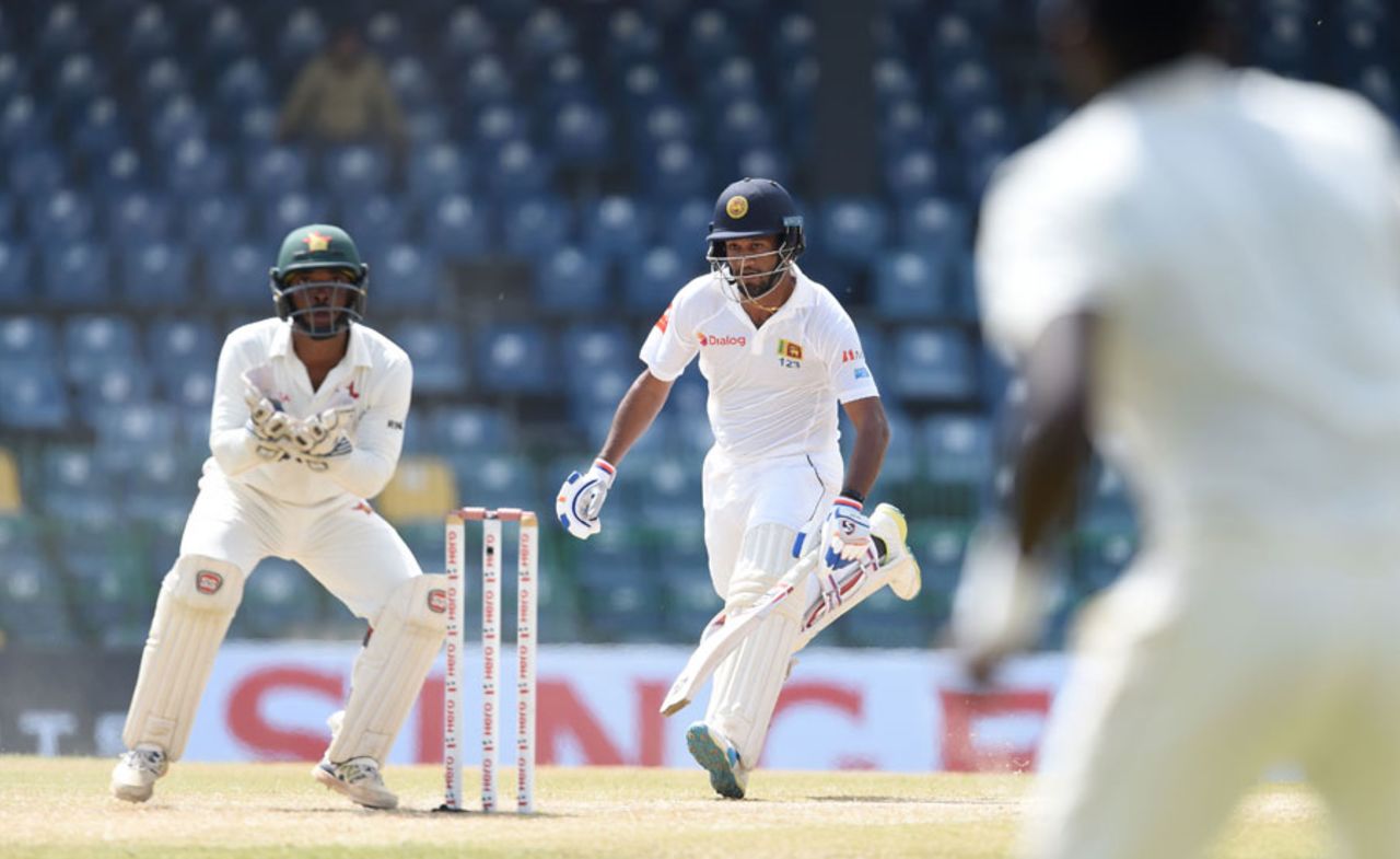 Dimuth Karunaratne pushes hard to make the crease, Sri Lanka v Zimbabwe, only Test, 4th day, Colombo, July 17, 2017