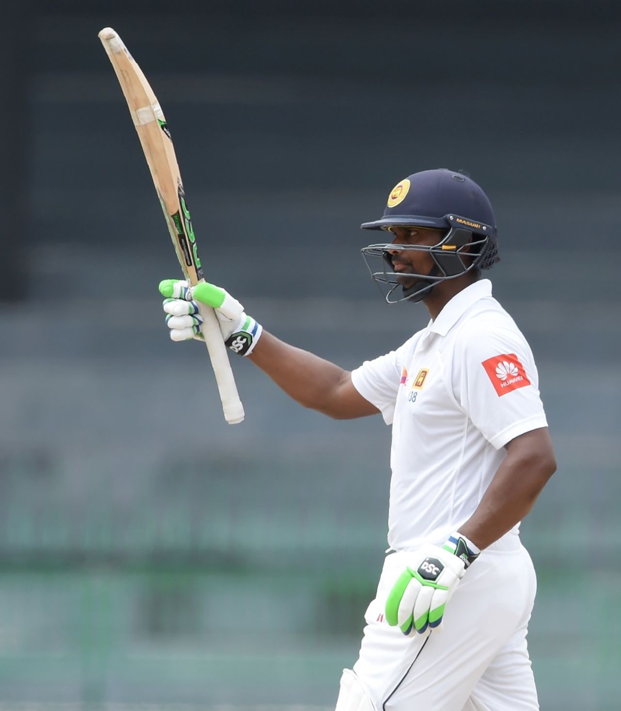 Asela Gunaratne acknowledges his fifty, Sri Lanka v Zimbabwe, only Test, 5th day, Colombo, July 18, 2017