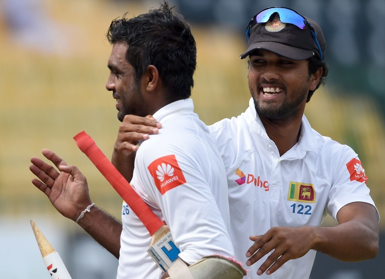 Dilruwan Perera and Dinesh Chandimal are all smiles after Sri Lanka's win, Sri Lanka v Zimbabwe, only Test, 5th day, Colombo, July 18, 2017