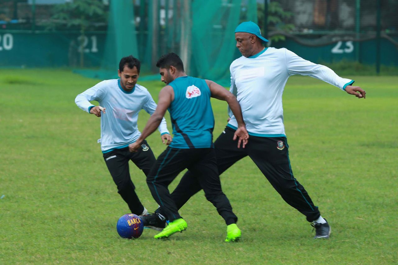 Bowling coach Courtney Walsh joins Bangladesh players as they engage in some football, Dhaka, July 20, 2017