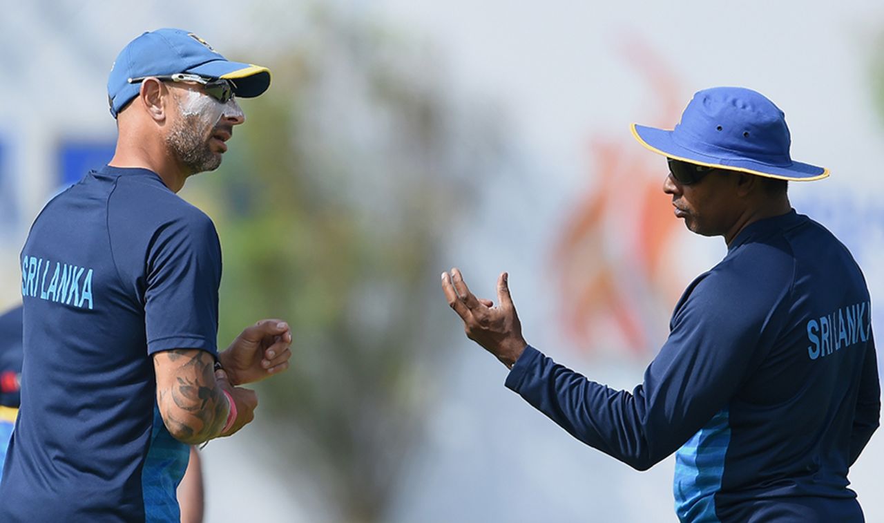 Sri Lanka's interim coach, Nic Pothas, and fast-bowling coach, Chaminda Vaas, supervise a training session, Galle, July 25, 2017
