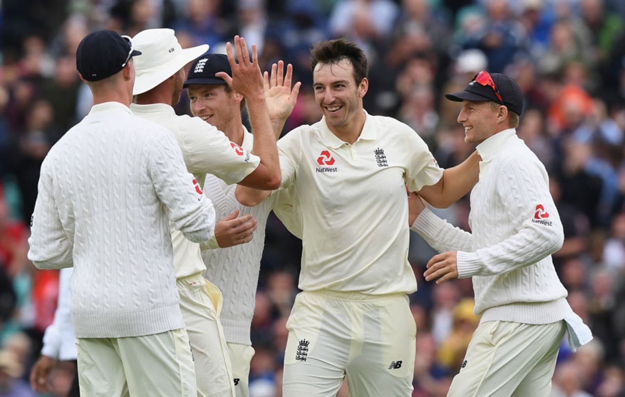 On a roll: Toby Roland-Jones is mobbed after claiming his fourth wicket, England v South Africa, 3rd Investec Test, The Oval, 2nd day, July 28, 2017