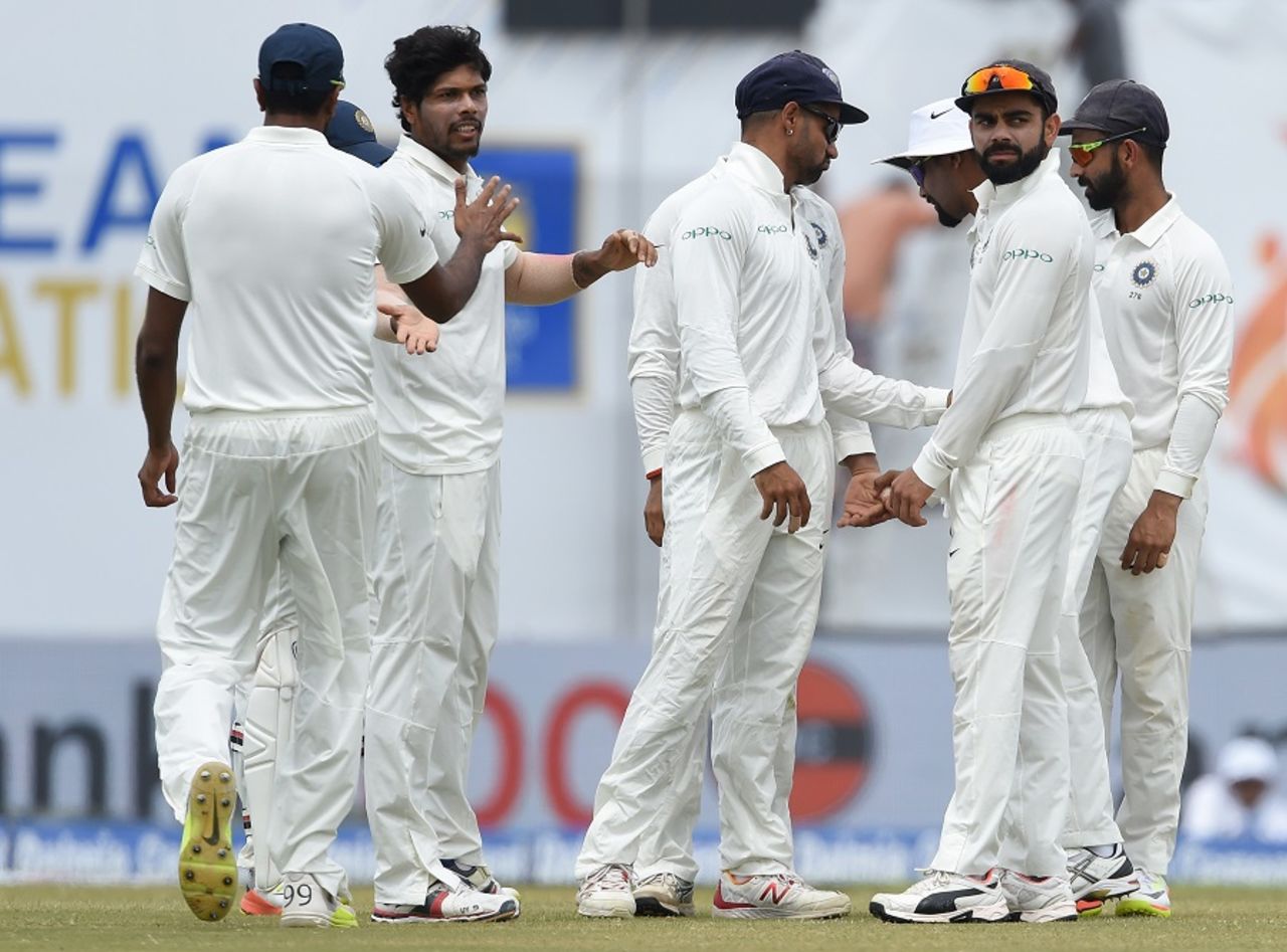 Umesh Yadav is mobbed by his team-mates, Sri Lanka v India, 1st Test, Galle, 4th day, July 29, 2017