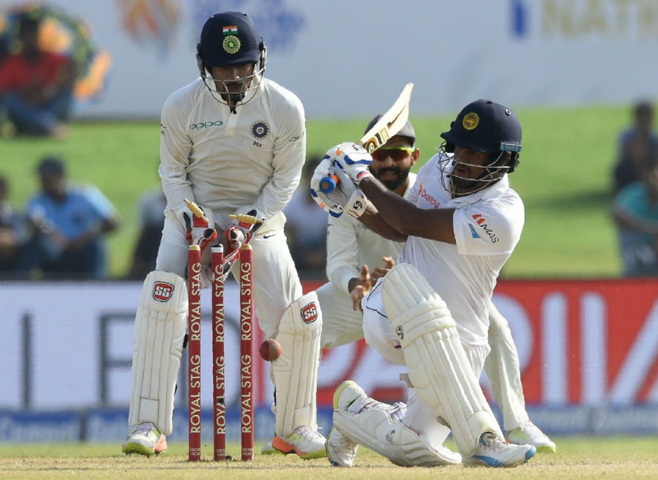 Dimuth Karunaratne dragged a sweep off R Ashwin onto the stumps, Sri Lanka v India, 1st Test, Galle, 4th day, July 29, 2017
