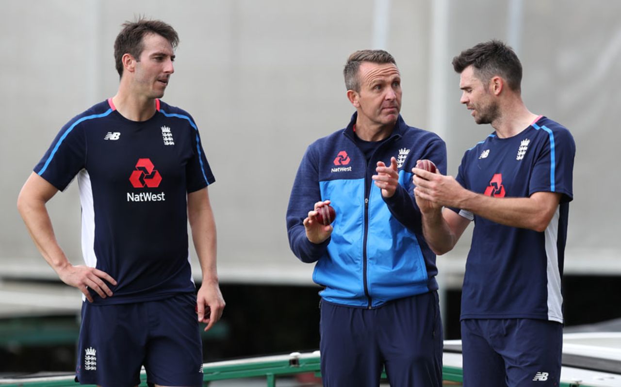 Toby Roland-Jones and James Anderson gets some tips from Dominic Cork, Old Trafford, August 2, 2017