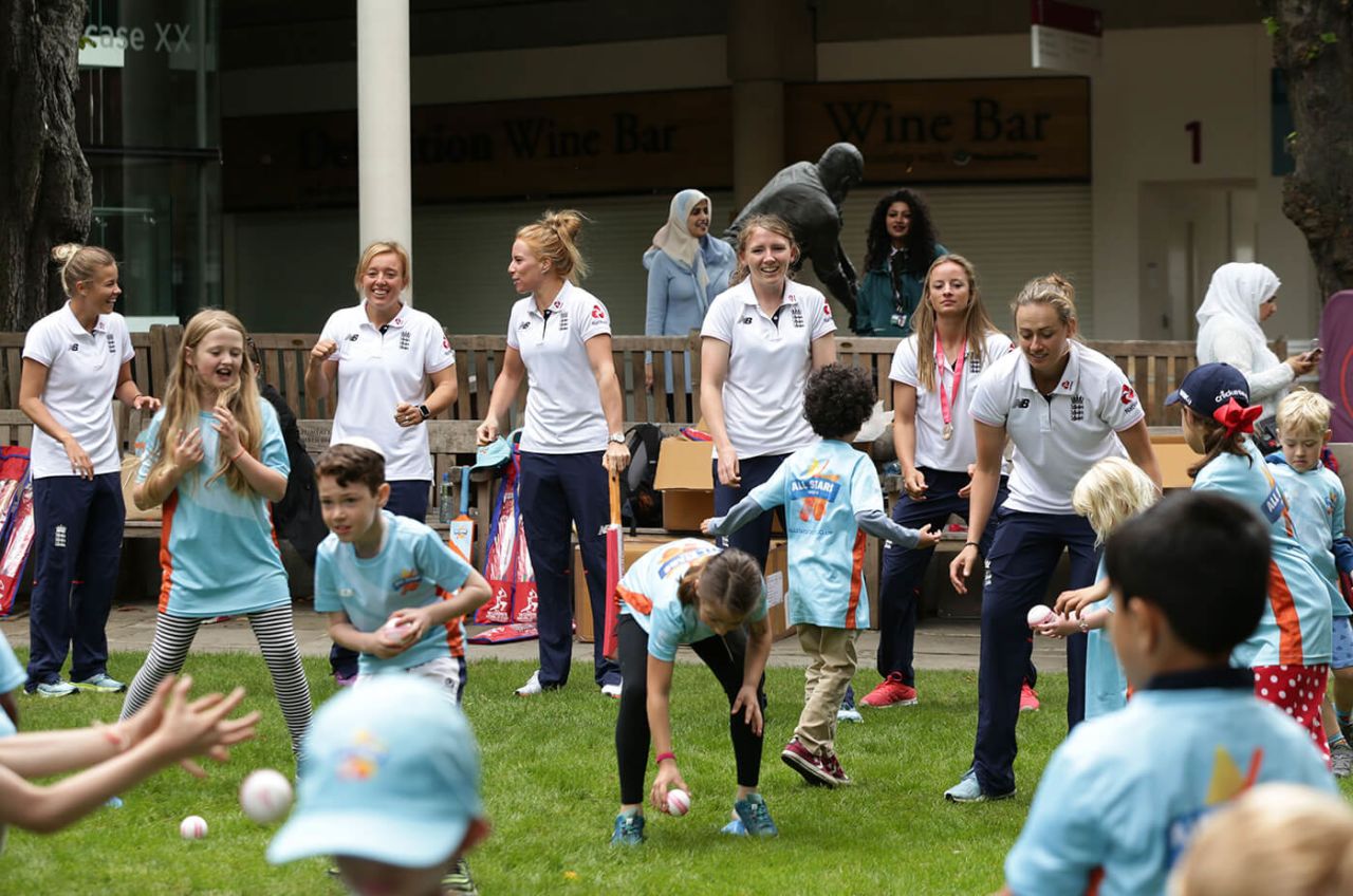 England's women players help kids from the All Stars Cricket programme at Lord's, July 24, 2017
