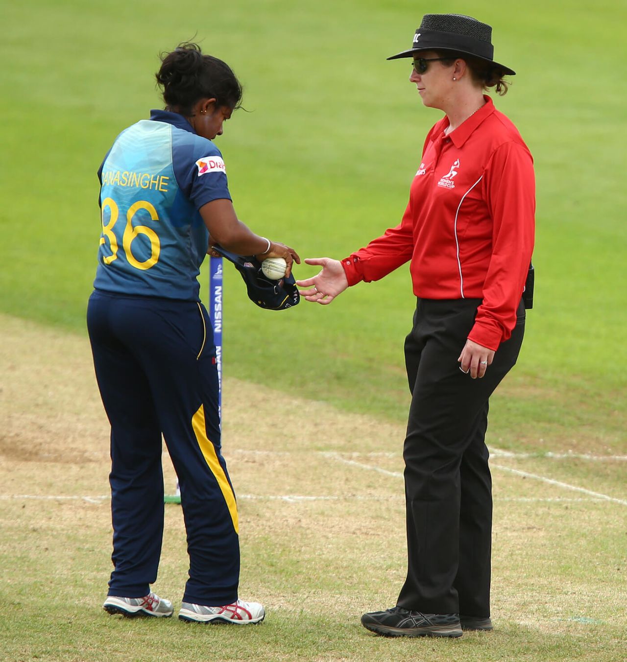 Umpire Claire Polosak takes the ball from Oshadi Ranasinghe, West Indies v Sri Lanka, Women's World Cup, July 9, 2017