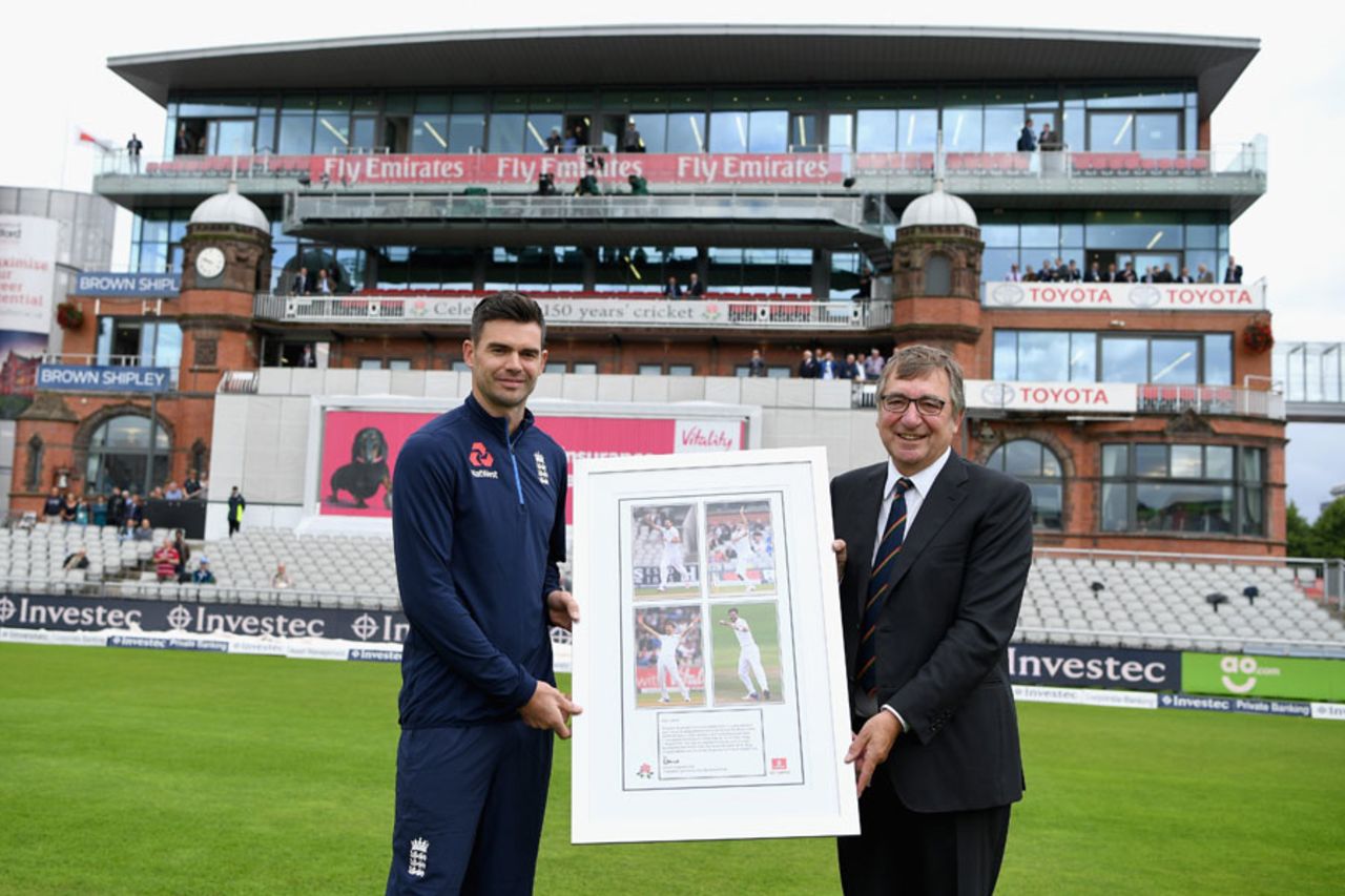 James Anderson receives a photo frame from Lancashire chairman David Hodgkiss at the unveiling of the James Anderson End, England v South Africa, 4th Investec Test, Old Trafford, 1st day, August 4, 2017