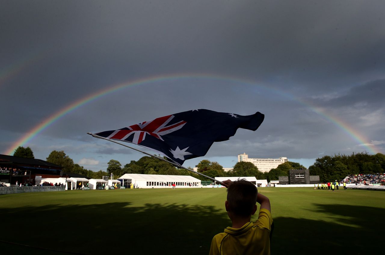 A rainbow frames the Australian flag during a match in Belfast, Ireland v Australia, Only ODI, Stormont, August 27, 2015