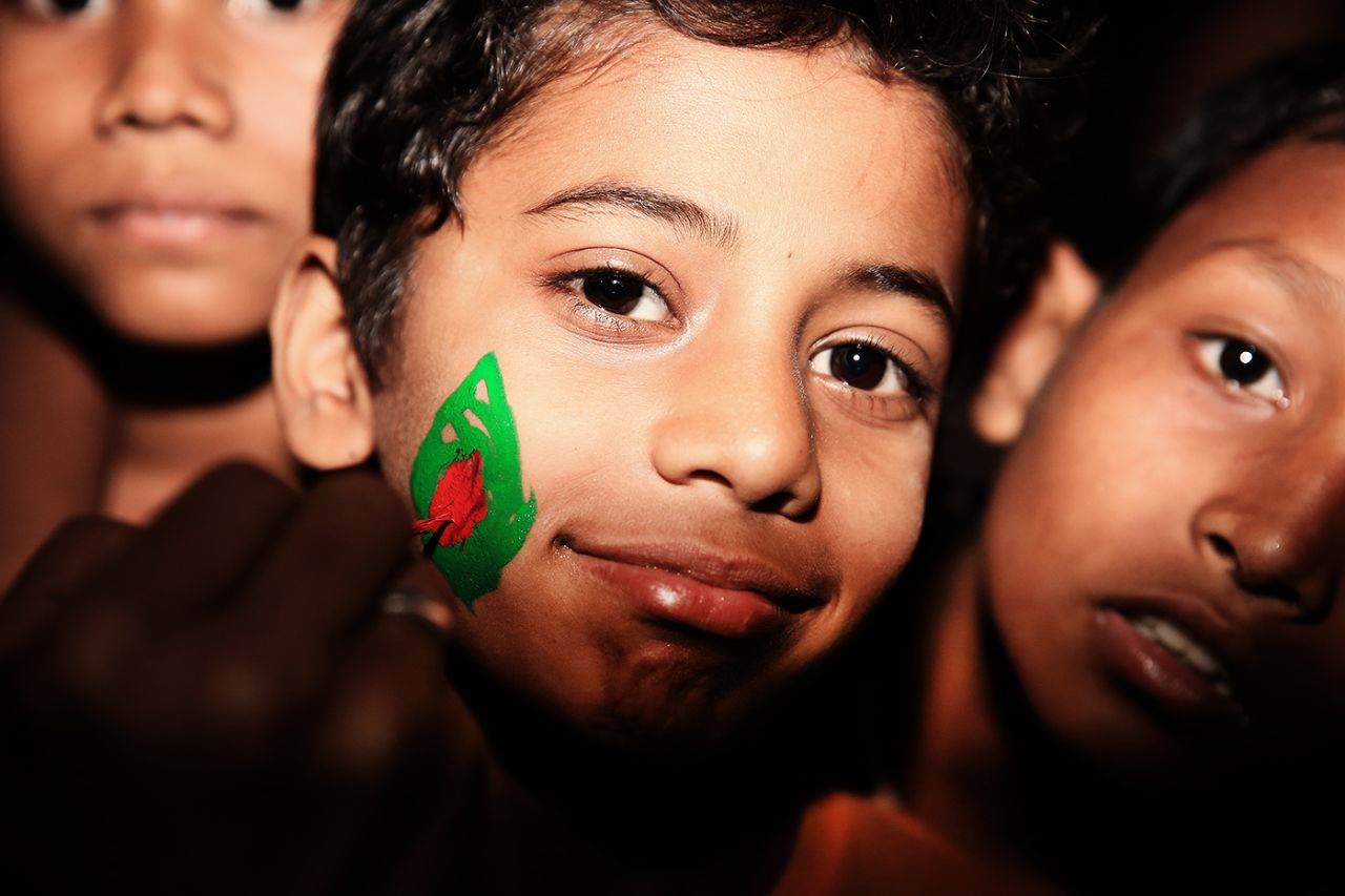 A young fan gets the Bangladesh flag painted on his face, Bangladesh v West Indies, World T20, Group 2, Mirpur, March 25, 2014